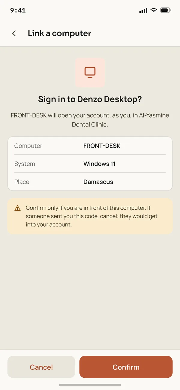 The phone asking to confirm signing in to Denzo Desktop