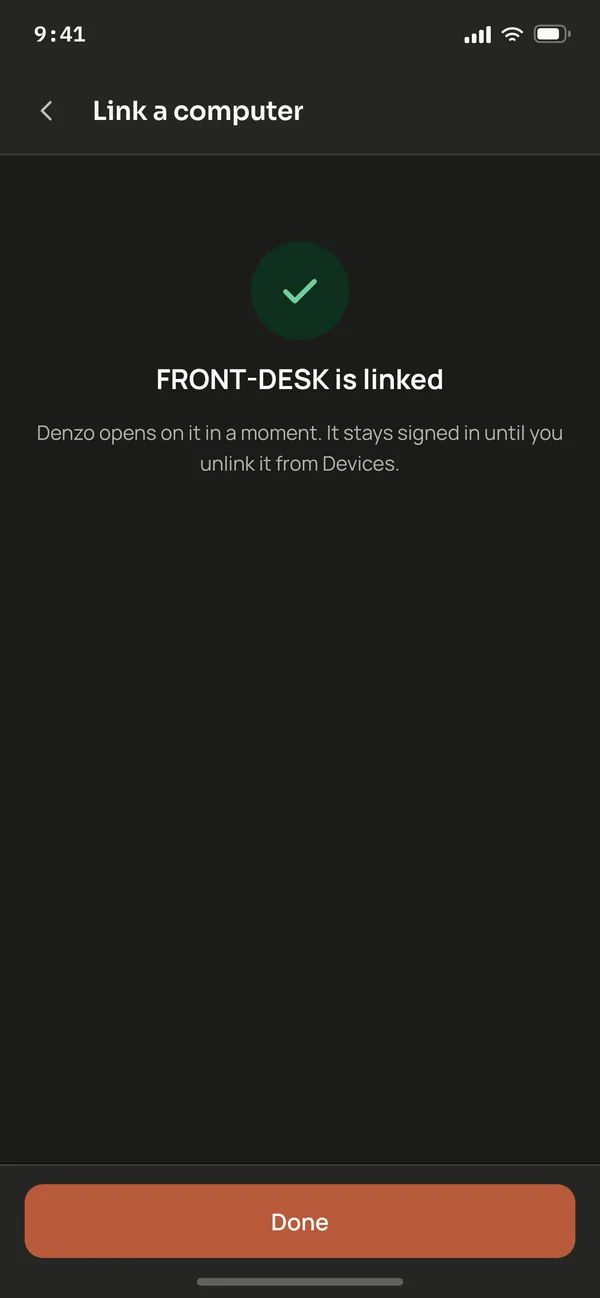The phone confirming the computer is linked